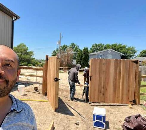 Cedar privacy fence crew install